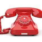 Old-fashioned phone on white isolated background